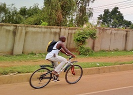 Cyclist in Kampala, Uganda